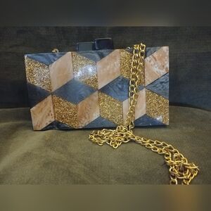 Geometric Gold and Black Clutch Bag